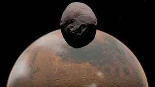 Учёные пытаются разгадать секрет двух спутников Марса