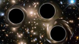 В миллиарде световых лет от нас сразу три галактики со сверхмассивными черными дырами в центре готовятся к слиянию